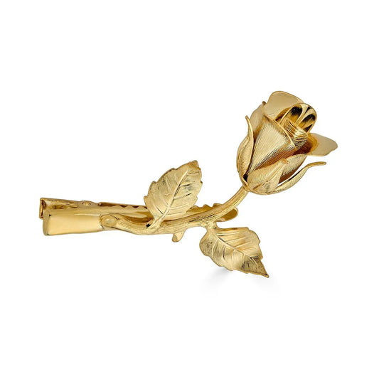 Elegant gold rose flower tie hair clip with detailed leaves for bridal hair and hair style on a white background.